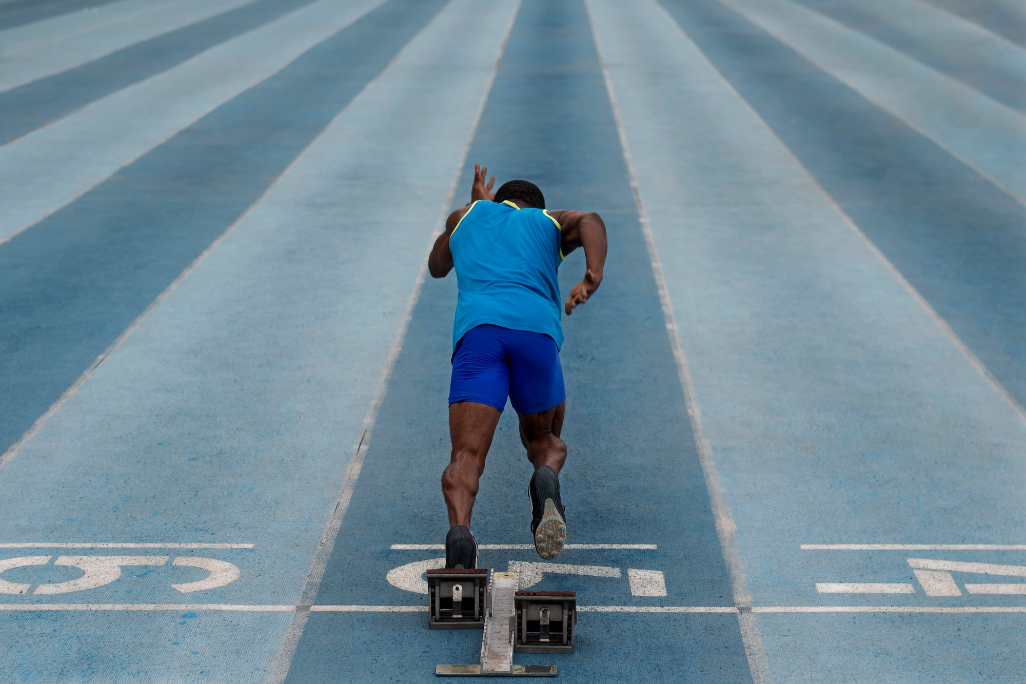 athlete-starting-line-stadium athlete-starting-line-stadium